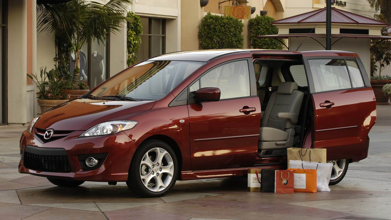 Front 3/4 view of 2009 Mazda5 with sliding door open