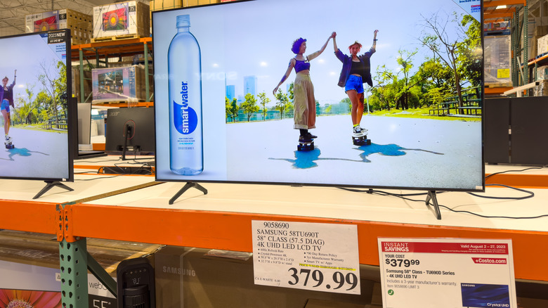 TV on display in Costco with discount announcement