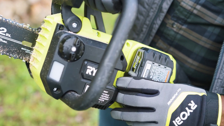 Ryobi One+ HP battery on chainsaw