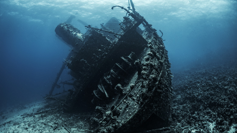 An old sunken ship wreck in shallower water