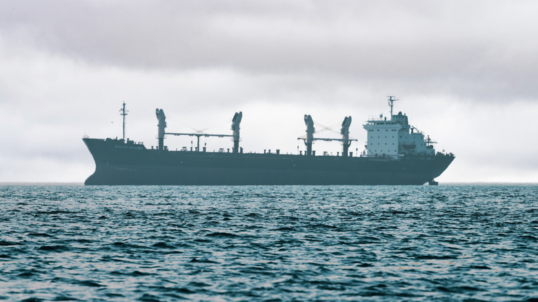A large ship in deep ocean water