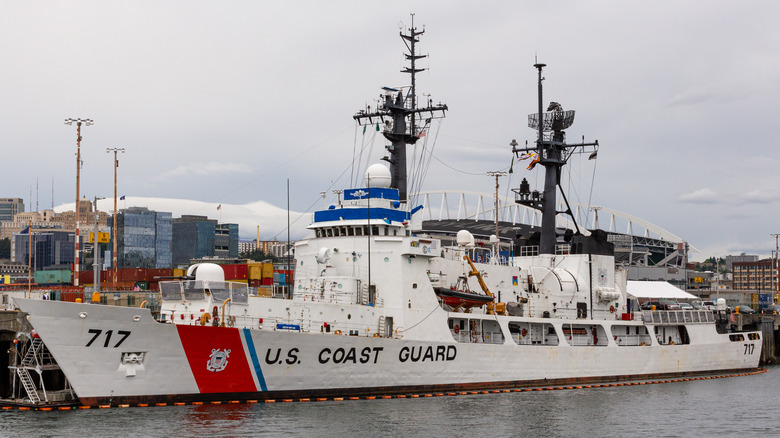 A U.S. Coast Guard ship at a dock.