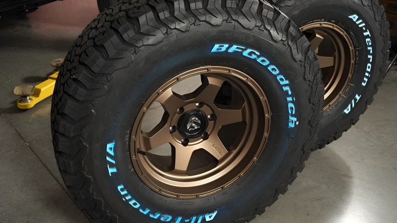 Two BFGoodrich tires with blue coating