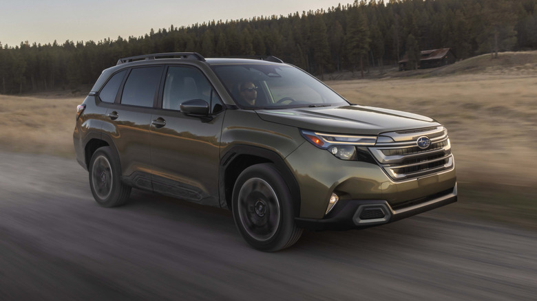 2025 Subaru Forester driving on a country road