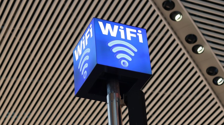 Blue cube displaying the WiFi sign mounted on a metal pole