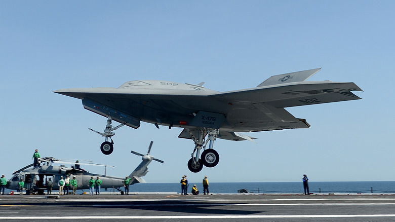 An  X-47B unmanned aircraft landing