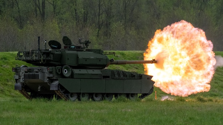 An M10 Booker firing its 105 mm M35 cannon in 2024