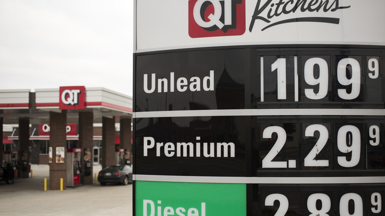 A QuikTrip gas station with a large sign advertising gas for $1.99 a gallon