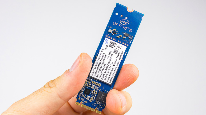 Person holding Intel Optance SSD.