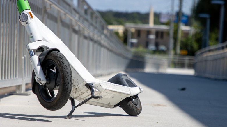 E-scooter leaning on railing