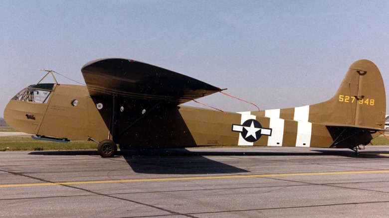 Waco CG-4A-GN glider parked on a tarmac