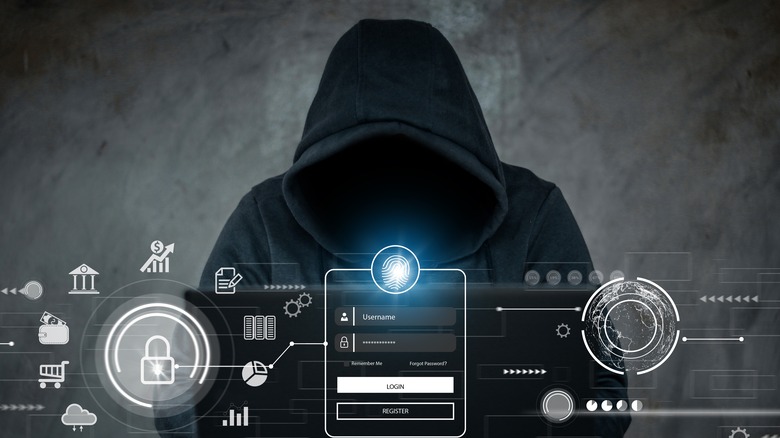 hooded person with data illustrations