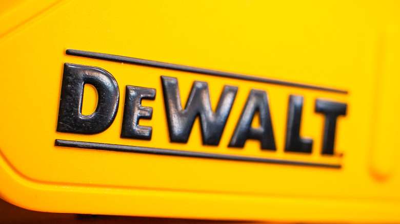 The DeWalt logo on the side of a tool.