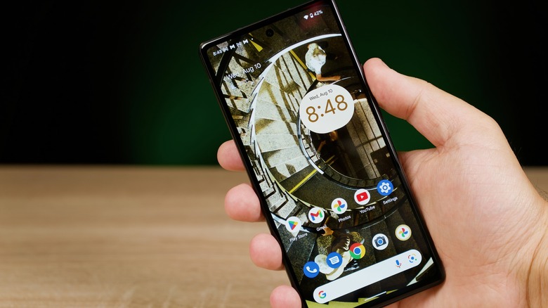 man holding google pixel 6a