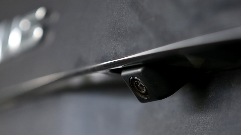 Car backup camera lens closeup