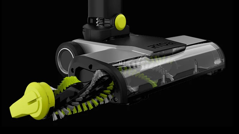 A Ryobi vacuum's roller bar being removed.