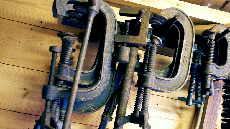 C-clamps on a storage rack