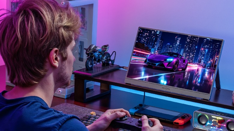 Gamer playing on Arzopa Z3FC Portable Monitor
