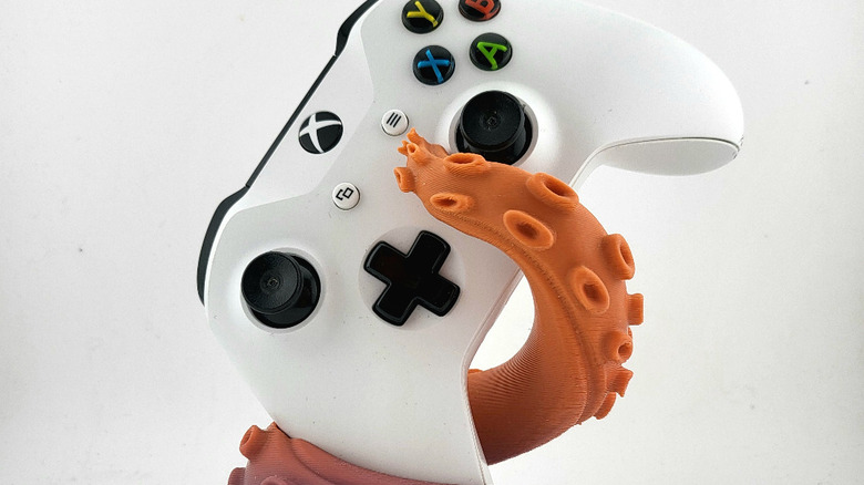 An Xbox stand modeled after a Kraken tentacle