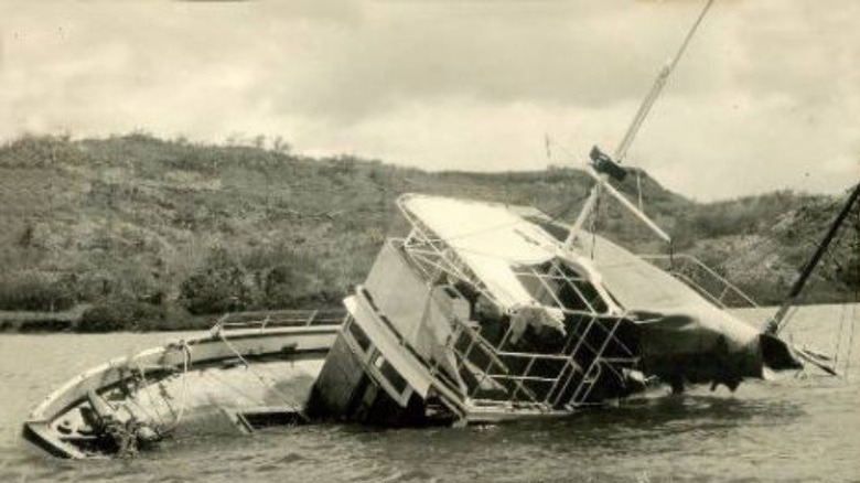 Wreck of the MV Joyita with island in the background