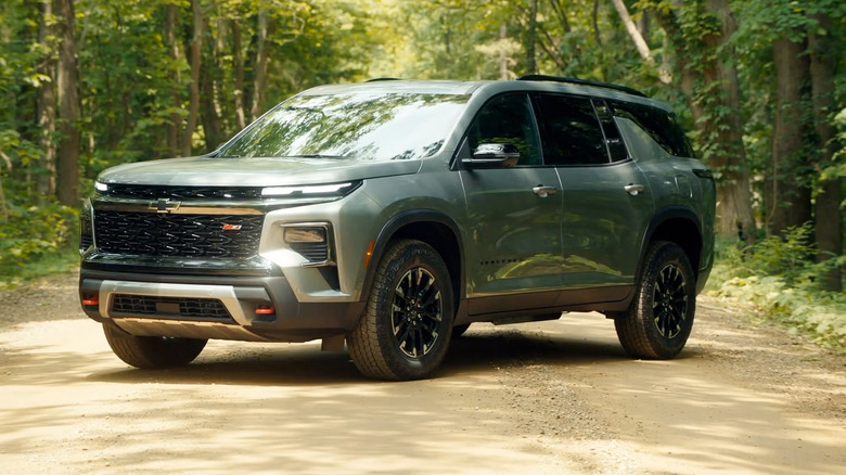 A green 2026 Chevrolet Traverse parked