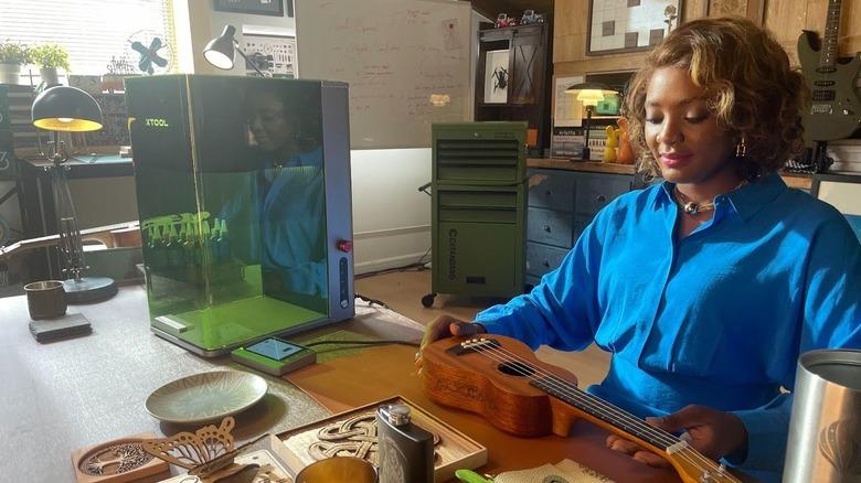 Woman working near xTool F1 Ultra