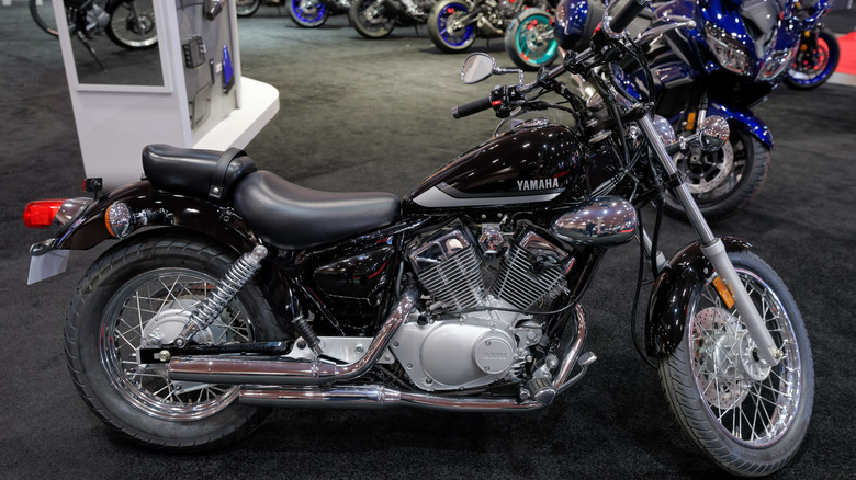 A Yamaha V Star 250 at a motorcycle show, side view