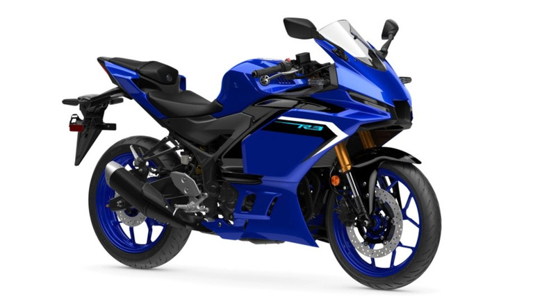 2025 Yamaha YZF-R3 in Team Yamaha Blue, front 3/4 view, white background