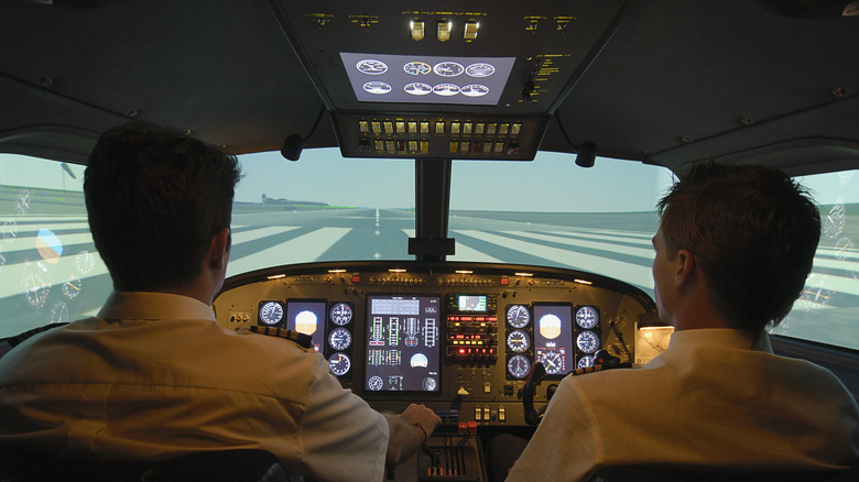 Pilots in the cockpit on a simulator