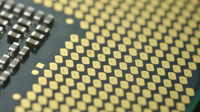 close-up of gold stamped contacts on microprocessor