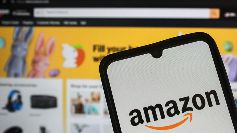 Phone and computer screen showing Amazon website