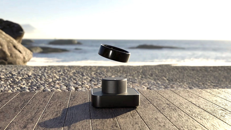Ultrahuman ring ad with ring floating by seaside