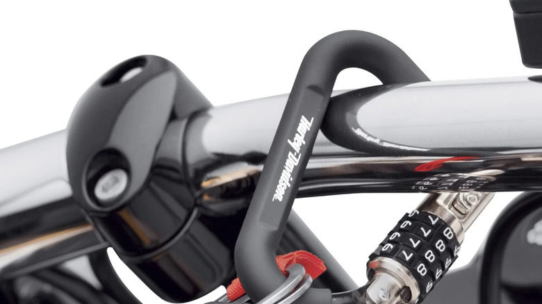 Harley-Davidson helmet lock on motorcycle handlebars