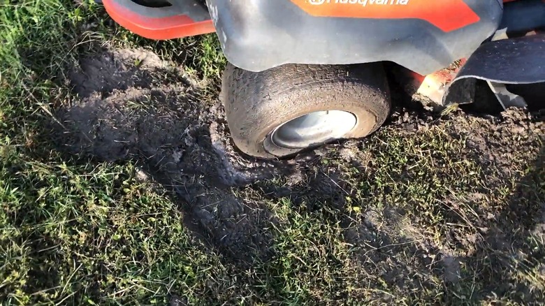 A zero-turn mower stuck in the mud