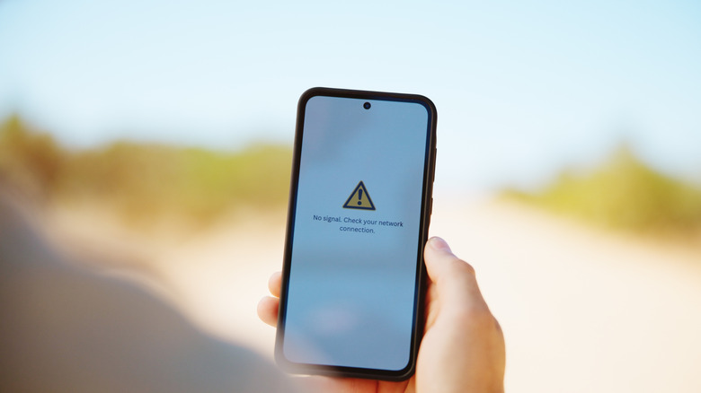 An Android smartphone with a No Signal warning on its display.