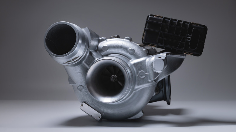 A new or refurbished turbocharger against a white background