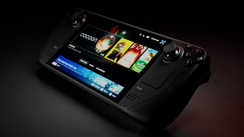 the steam deck oled on a black table