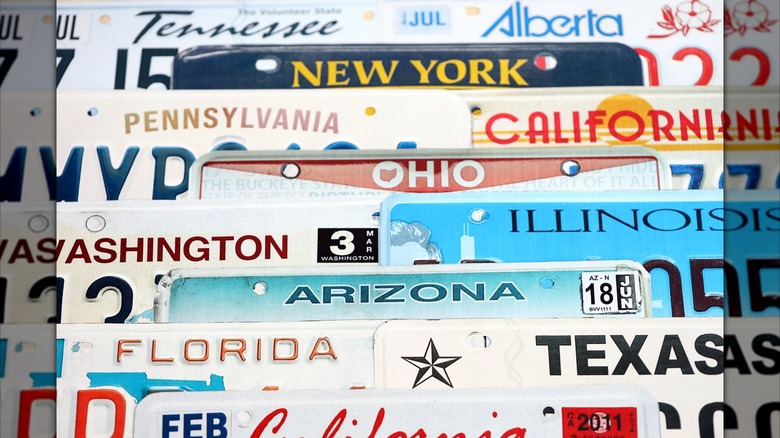 Old U.S. car license plates with various state names