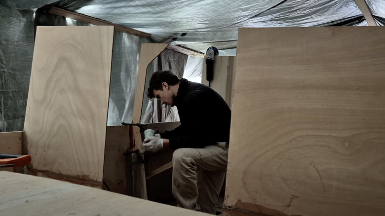 Lukas building solar yacht out of wood