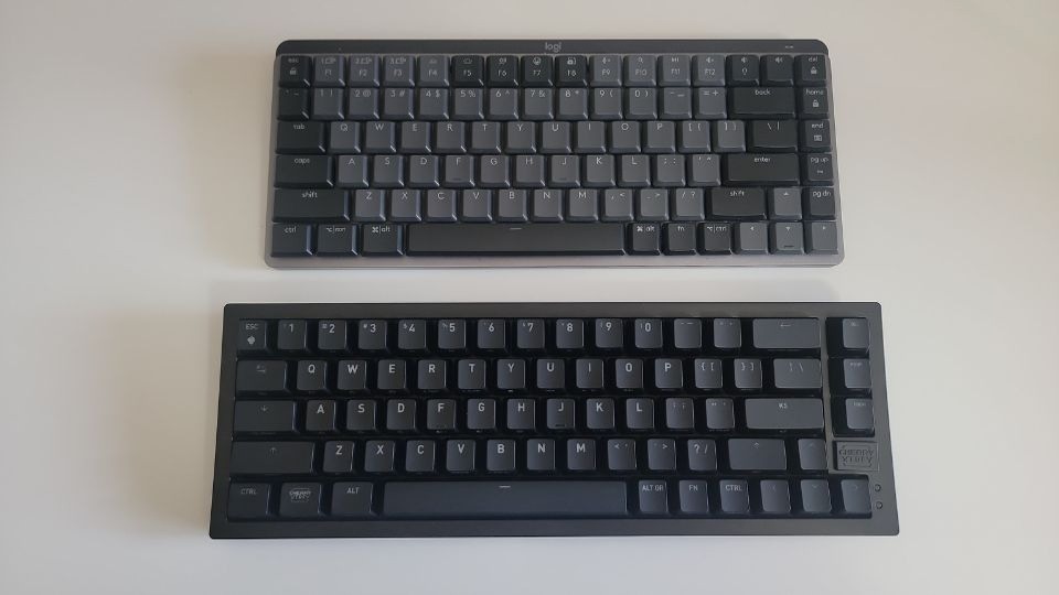 CHERRY XTRFY K5V2 keyboard next to Logitech MX Mechanical Mini