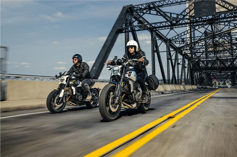 Two riders driving 2024 CFMOTO 700CL-X