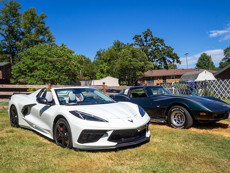 2024 Chevrolet Corvette Stingray Convertible parked next to 1979 Chevrolet Corvette Coupe