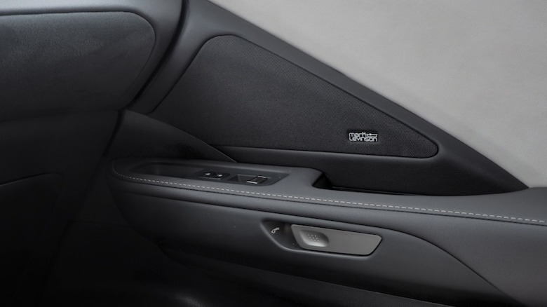 Door panel with electronic latch control