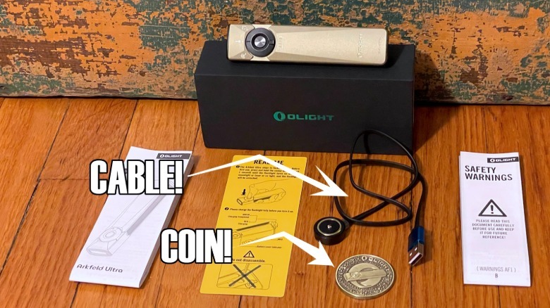 Olight flashlight box contents