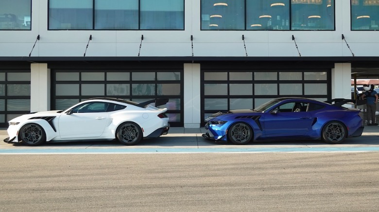 Two Mustang GTD parked in pits