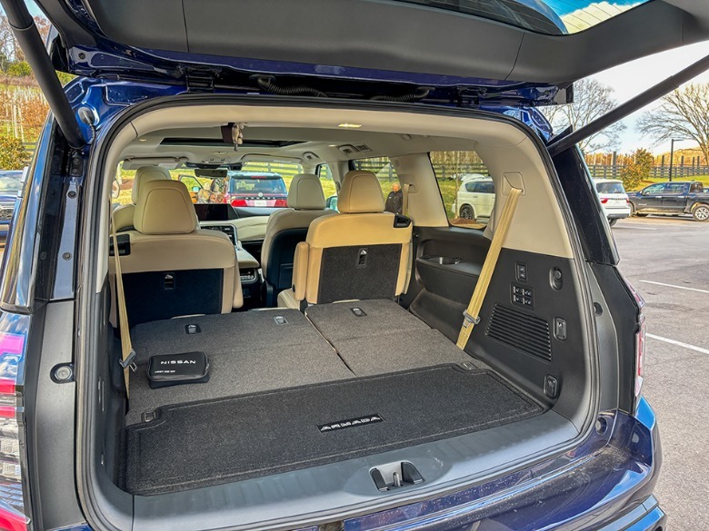 2025 Nissan Armada Platinum rear cargo area with third row folded flat