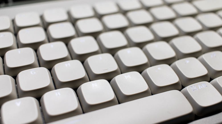 barely legible keycaps with LED light on