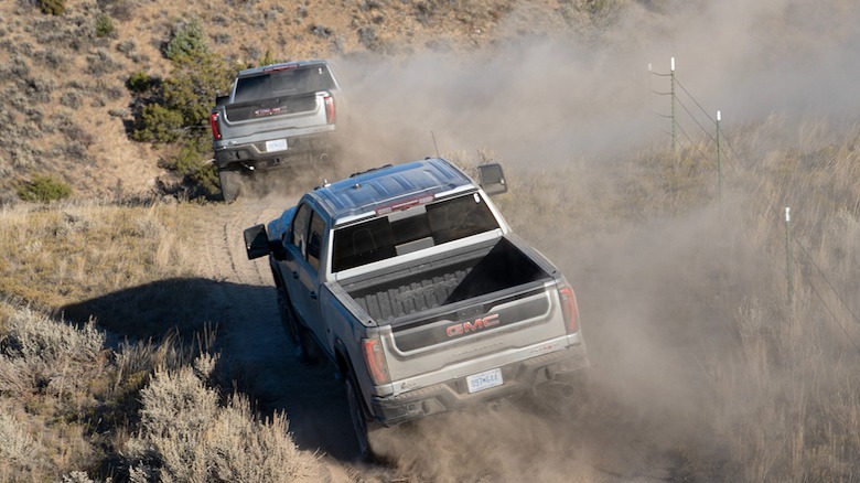 GMC Sierra HD AT4X AEV dust clouds