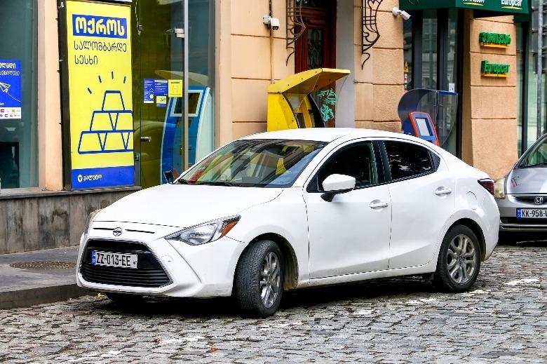 Scion iA parked street