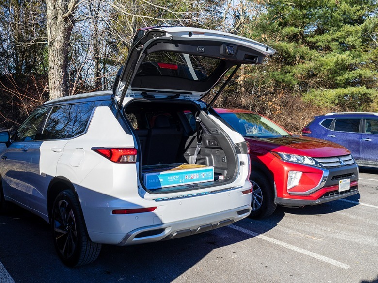 2023 Mitsubishi Outlander PHEV parked with tailgate open